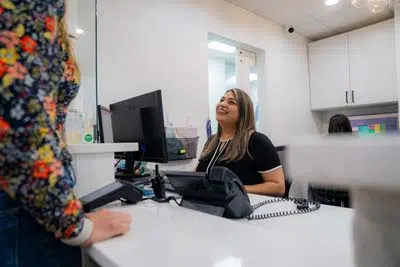 patient scheduling her next dental appointment at North Texas Smiles in Fort Worth, TX