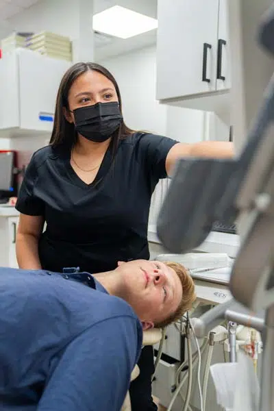 teenage patient receiving dental care at North Texas Smiles in Fort Worth, TX